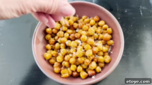 Vibrant Seared Salmon Salad with Crispy Chickpeas and Zesty Strawberry Vinaigrette 11 Salted garbanzo beans in a bowl