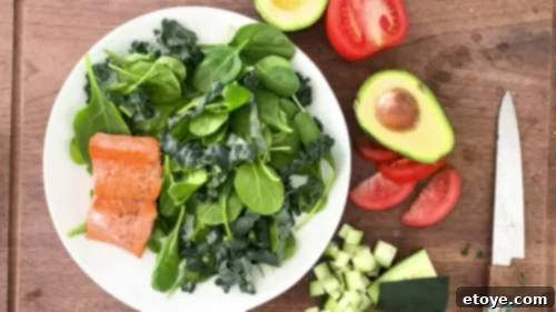 Vibrant Seared Salmon Salad with Crispy Chickpeas and Zesty Strawberry Vinaigrette 6 Resting seared salmon on a plate