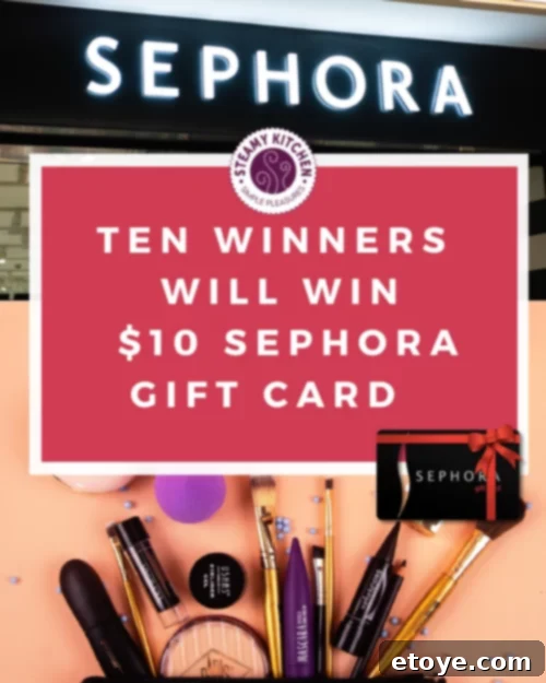 Win an Instant $10 Sephora Gift Card 4 Assortment of high-end beauty products from Sephora, including makeup, skincare, and fragrances, neatly arranged to inspire shopping.