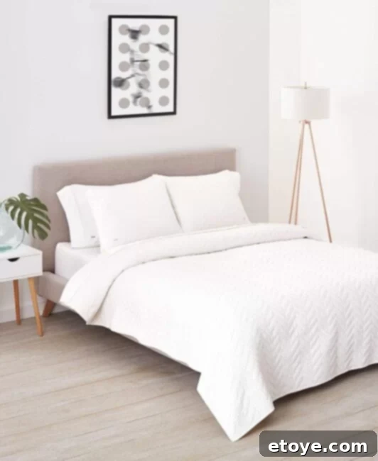 Lacoste Harrington Quilt Set styled in a modern bedroom