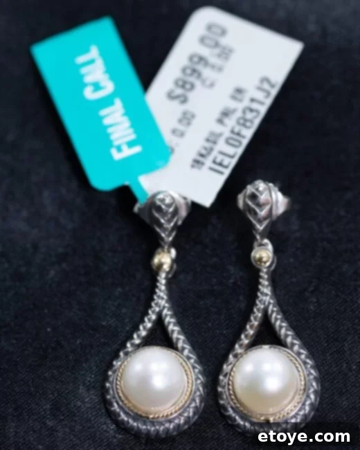 Win Effy's Lustrous Pearl Earrings Sterling and 18K Gold 5 Close-up of the elegant Effy Sterling Silver and 18K Gold Pearl Earrings, highlighting the pearl's luster.