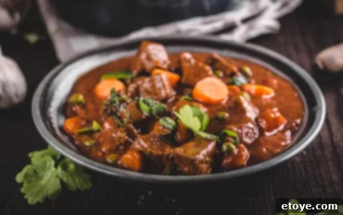 bowl of steak carrots meat potatoes
