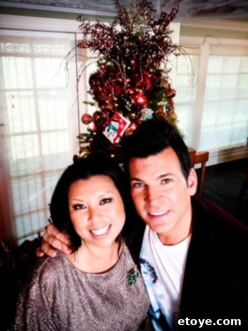 An Evening of Harmony with Jewel and David Tutera 8 A group of people, including David Tutera, posing happily