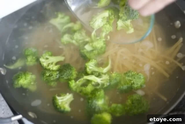 Rich Miso Chicken Pasta 4 Diced boneless, skinless chicken breast pieces seasoned with salt and pepper, ready for cooking.