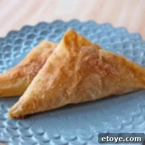 Flaky Apple Cinnamon Bourekas 2 Finished Apple Cinnamon Bourekas fresh from the oven, golden brown and flaky