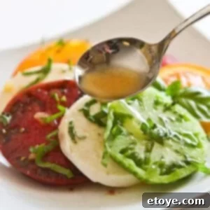 close-up image of a jar of Asian orange vinaigrette with ginger