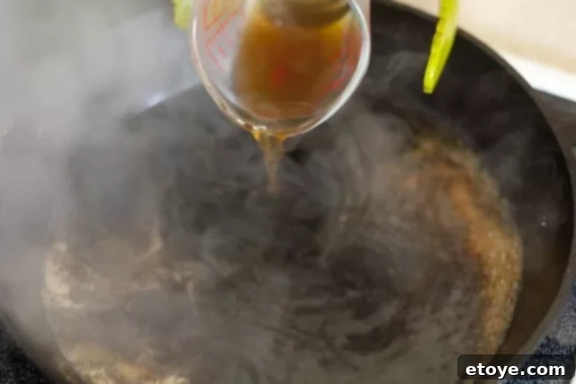 Orange Miso Steak Cooking_2 Deglazing the pan with beef stock for the sauce