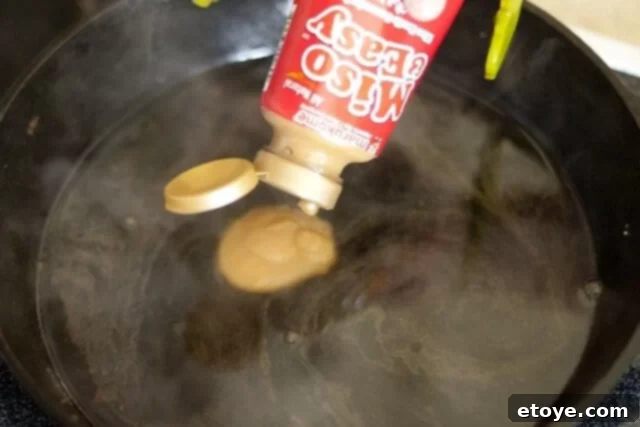 Orange Miso Steak Cooking_3 Adding miso, mirin, and sesame oil to the pan sauce