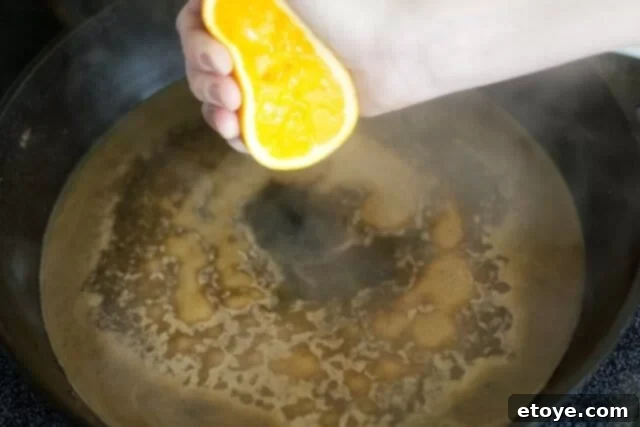 Orange Miso Steak Cooking_5 Squeezing fresh orange juice into the miso sauce