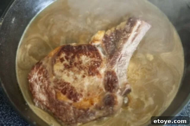 Orange Miso Steak Cooking_6 Steaks simmering in the orange miso sauce