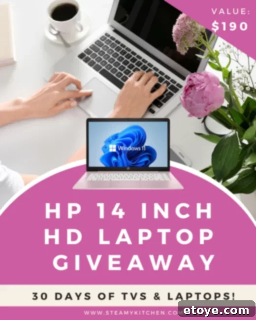 Win an HP 14-inch HD Laptop! 3 Close-up view of the HP 14 Inch HD Laptop showcasing its sleek design and screen