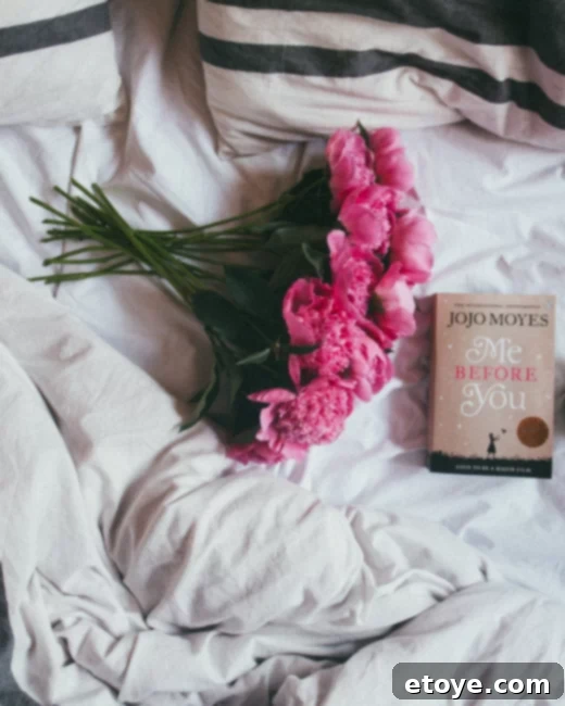 A person cleaning a pristine, sparkling kitchen, representing the joy of a professionally cleaned home
