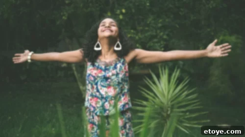 Living With Purpose: The Art of Crafting Magical Moments for Yourself and Others 2 Arms open wide in a beautiful natural setting, symbolizing gratitude and connection to the environment.