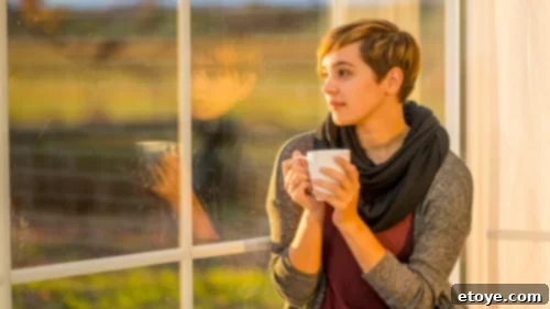 A person meditating peacefully outdoors, emphasizing being present in the moment