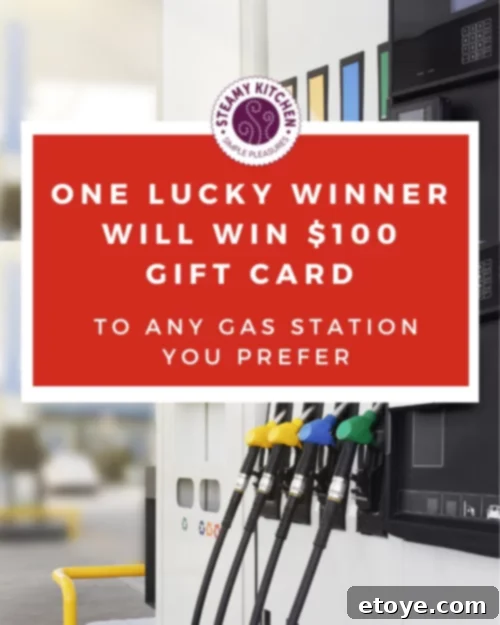 Day 21 Win a 100 Gas Gift Card 5 A hand holding a $100 gas gift card prominently against a backdrop of a car and a scenic road, highlighting travel potential.