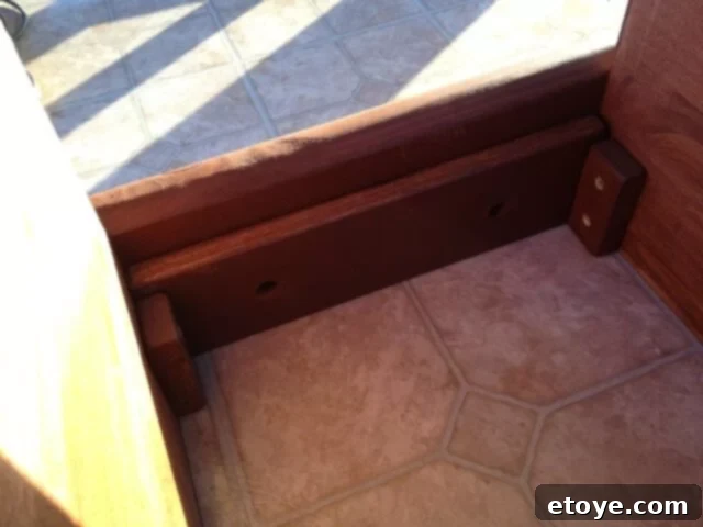 Coop Cleaning Stopper Blocks Removable stopper blocks installed at the base of the chicken coop door.