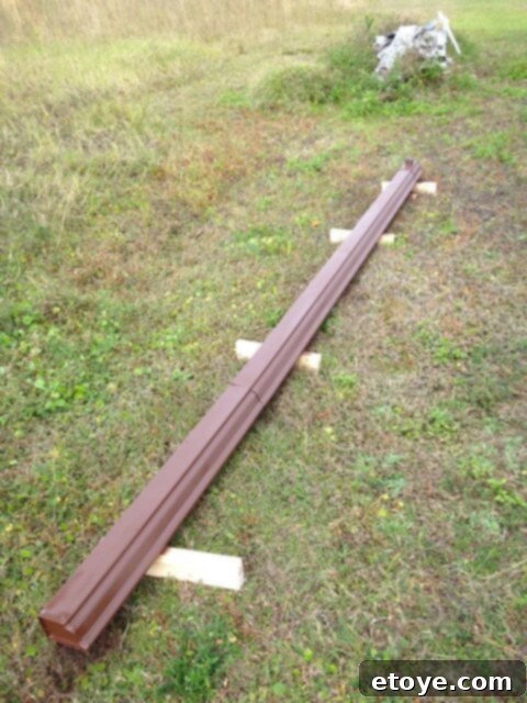 Chicken Coop Gutter Assembly Assembled and painted gutter pieces for the chicken coop roof.