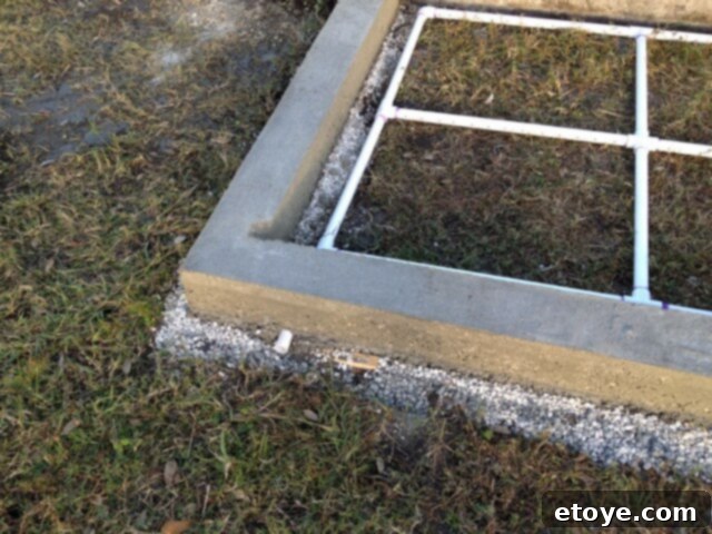 Chicken Coop PVC Drainage Installation PVC pipe drainage system being installed in the chicken coop foundation.