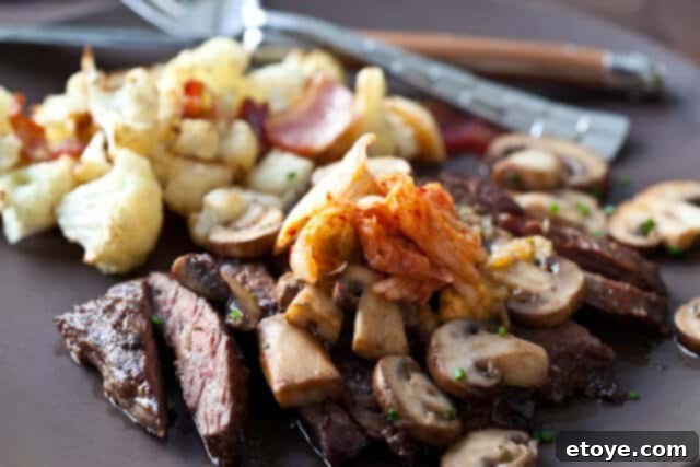 Fiery Kimchi Butter Steak 2 Delicious steak with a dollop of homemade kimchi butter, ready to be served.