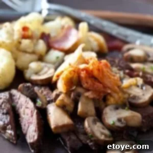 Fiery Kimchi Butter Steak 10 Grilled steak topped with melted kimchi butter and sautéed mushrooms, served with fresh chives.