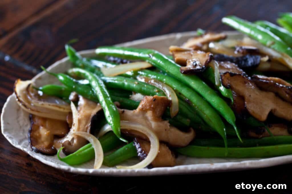 Savory Shiitake and Green Bean Stir-Fry 7 A vibrant close-up of the Green Bean and Mushroom Stir-Fry, ready to be enjoyed.