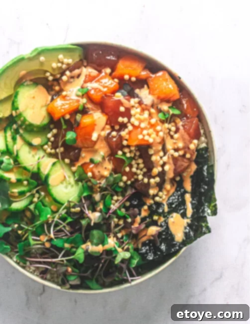 Spicy Mayo dressing drizzled over buddha bowl