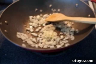 Spicy Miso Steamed Mussels 4 Adding ginger to the sautéed aromatics