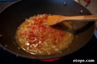 Spicy Miso Steamed Mussels 6 Adding miso paste to the simmering broth