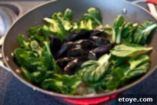 Spicy Miso Steamed Mussels 7 Adding leafy vegetables to the broth
