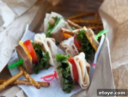 Lunchbox Love: Smart & Healthy School Lunches for Kids 7 Cut sandwich pieces with small skewers for lunch