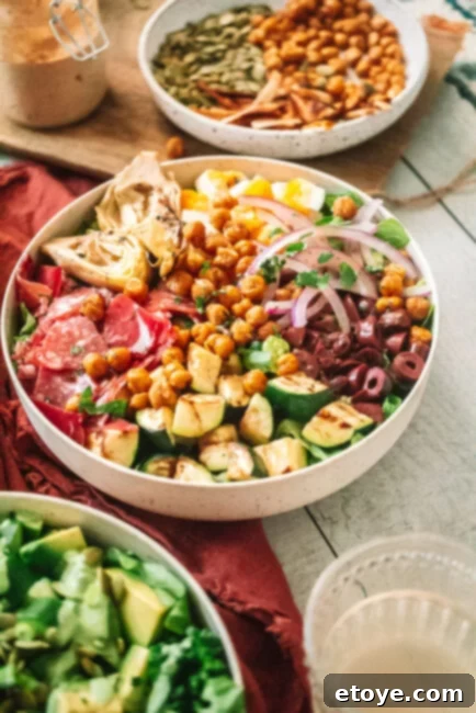 Classic Italian Chopped Salad 2 Italian Chopped Salad in a white bowl with a red tablecloth background