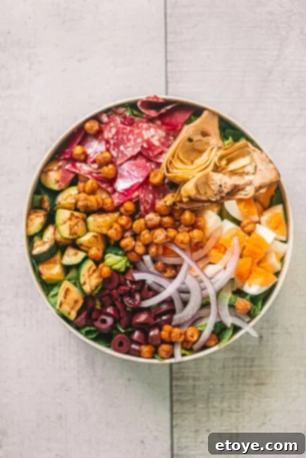 Classic Italian Chopped Salad 4 Italian Chopped Salad in a white bowl, top-down view showing all ingredients