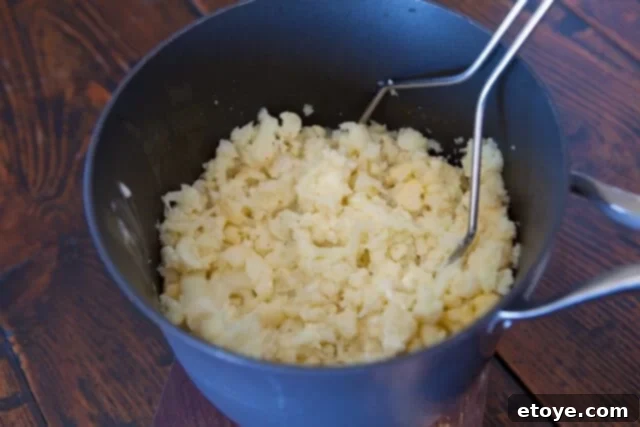 Cauliflower Mashed Potatoes Recipe: use a potato masher Cauliflower Mash Recipe use a potato masher