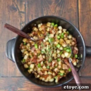 Loaded Bacon Potato Broccoli Hash 3 Broccoli, Potato, and Bacon Hash presented in a skillet