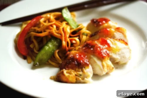 Roast Chicken with Sweet Plum Sauce Delicious Roast Chicken with a glistening Sweet Plum Sauce, ready to be served