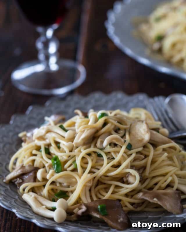 Garlic Noodles Miso Butter Recipe Rich and savory garlic noodles with miso butter, topped with fresh mushrooms