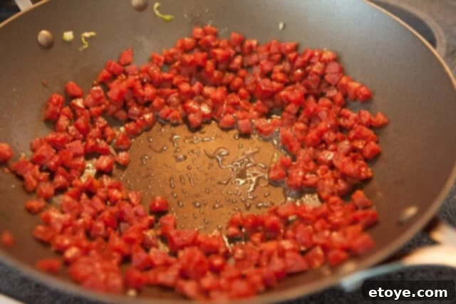 Stir-fried Brussels Sprouts with Chinese Sausage 5 Cooked Chinese Sausage in Wok