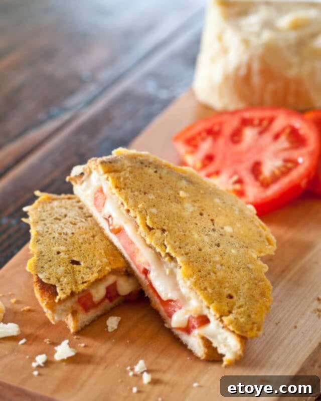 Frico-Crusted Grilled Cheese 2 A perfectly golden Super Frico Grilled Cheese sandwich with a crispy Parmesan crust, served on a rustic wooden board.