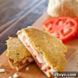 Frico-Crusted Grilled Cheese 7 Close-up of a Super Frico Grilled Cheese sandwich with a golden, crispy Parmesan crust.