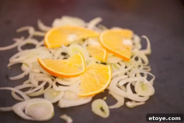 Layering Fennel and Orange on Baking Sheet