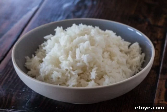 Delicious, fluffy microwave rice ready to serve as a perfect side dish