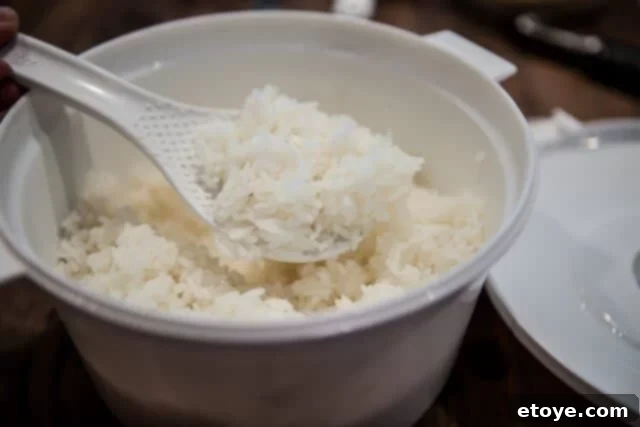 Microwave rice cooking in progress: precise timing is key for perfect results