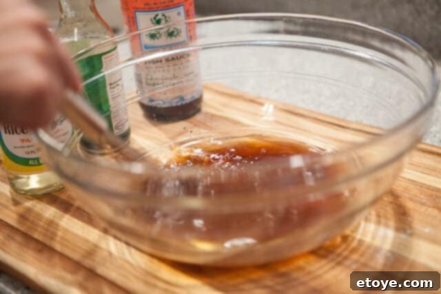 Mixing the Sweet and Savory Caramel Sauce Caramel Braising Sauce Ingredients - Bowl with mixed braising sauce ingredients