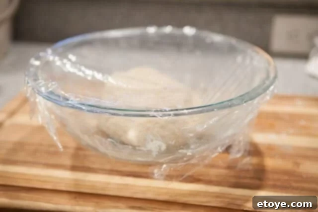 First Proofing of Steamed Bun Dough Dough Resting for Rise - Covered bowl of dough during the first proof