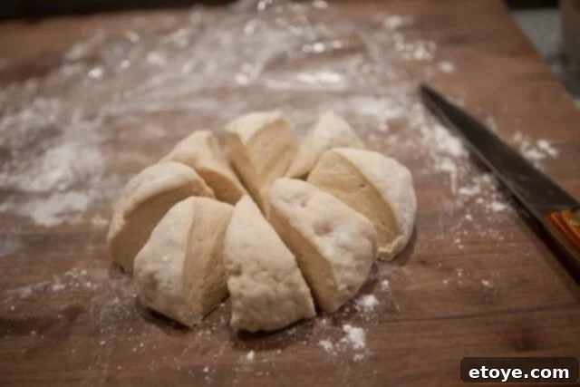 Dividing Dough for Buns Dough Divided into 8 Pieces - Dough cut into large sections