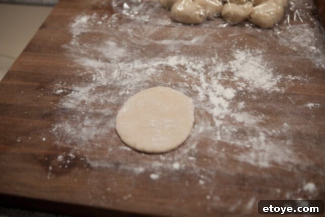 Perfectly Oval Dough for Buns Oval Shaped Dough - A piece of dough rolled into an oval
