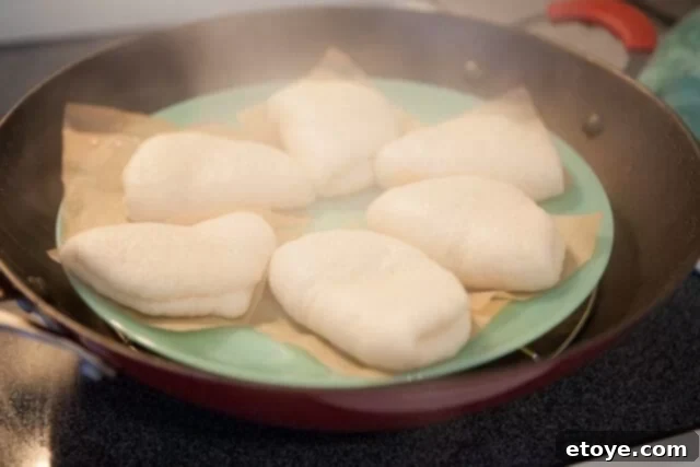 Freshly Steamed Buns, Fluffy and Hot Hot Steamy Buns - Freshly steamed, puffed-up buns