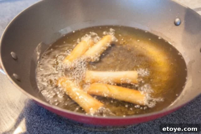 Cook Spring Rolls until Golden Brown