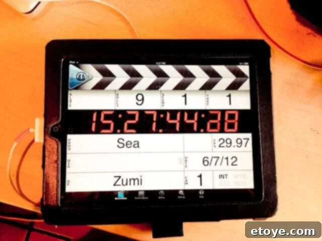 Vietnamese Spring Rolls with Slow Cooker Pork Recipe Blogger filming a cooking segment with an iPad visible on set