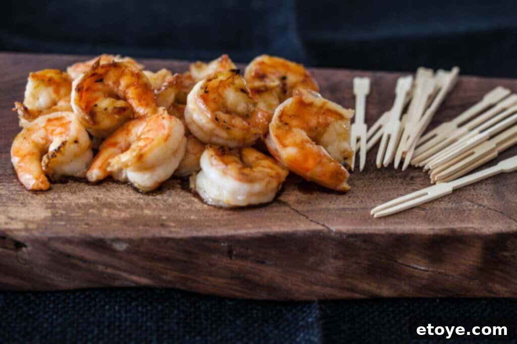 Miso Butter Shrimp Recipe shrimp on wood plank